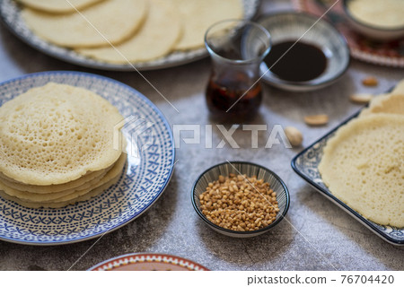 Atayef Qatayef, katayef is an Arab dessert commonly served during the month of Ramadan. Middle Eastern pancakes 76704420