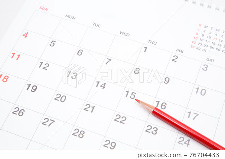 Calendar and red pencil (no year / month notation) Calendar and red pencil (no year / month notation) 76704433