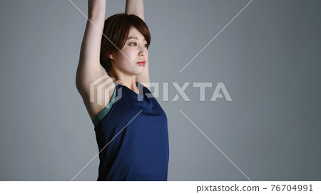 Stretching woman exercise fitness 76704991