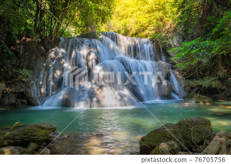 Huay Mae Khamin Waterfall consists of 7 levels. It is a beautiful waterfall in deep forest. It is an important and popular tourist destination in Kanchanaburi, Thailand. 76705756