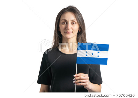 Happy young white girl holding Honduras flag isolated on a white background 76706426