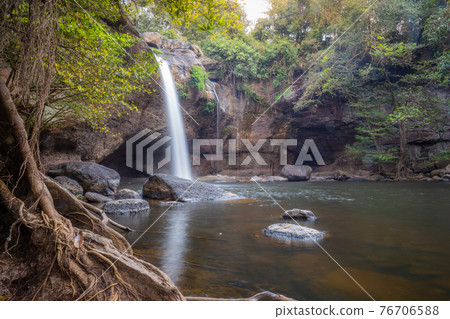 Amazing Haew Suwat Waterfall in the deep forest at Khao Yai National Park, Pak Chong, Thailand. Amazing Haew Suwat Waterfall in the deep forest at Khao Yai National Park, Pak Chong, Thailand. 76706588