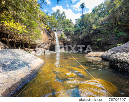 Amazing Haew Suwat Waterfall in the deep forest at Khao Yai National Park, Pak Chong, Thailand. Amazing Haew Suwat Waterfall in the deep forest at Khao Yai National Park, Pak Chong, Thailand. 76706597