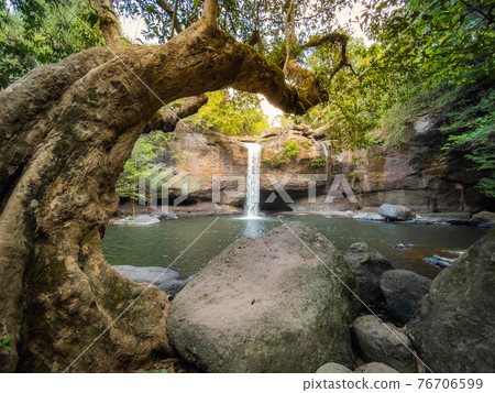 Amazing Haew Suwat Waterfall in the deep forest at Khao Yai National Park, Pak Chong, Thailand. Amazing Haew Suwat Waterfall in the deep forest at Khao Yai National Park, Pak Chong, Thailand. 76706599