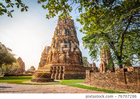 Wat Chaiwatthanaram temple at sunset in a historical park in Ayutthaya, Thailand. Wat Chaiwatthanaram temple at sunset in a historical park in Ayutthaya, Thailand. 76707286