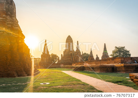 Wat Chaiwatthanaram temple at sunset in a historical park in Ayutthaya, Thailand. Wat Chaiwatthanaram temple at sunset in a historical park in Ayutthaya, Thailand. 76707317