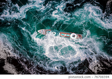 Storm waves of the sea around the ship. 76708394