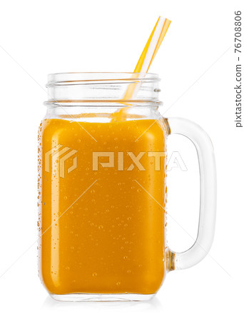 mason jar of mango smoothies isolated on white 76708806