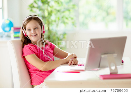 Online remote learning. School kids with computer. Online remote learning. School kids with computer. 76709603