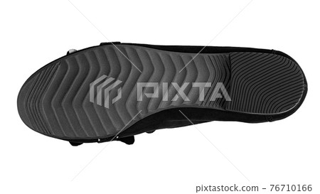 The sole of a suede shoe isolated on a white background. The sole of a suede shoe isolated on a white background. 76710166