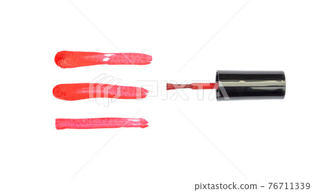 Red nail polish on a white background. 76711339