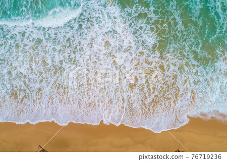Beautiful sea wave white sand beach aerial view big serve wave 76719236