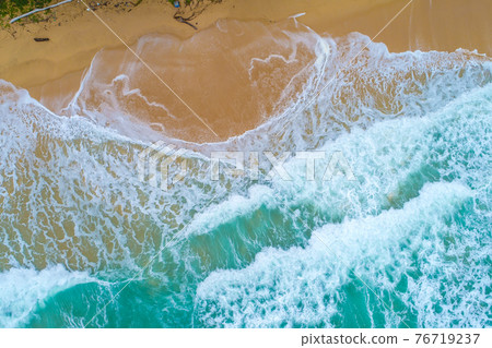 Beautiful sea wave white sand beach aerial view big serve wave 76719237