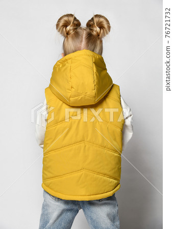 Girl in casual yellow outwear sleeveless vest with 76721732