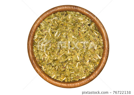 Mate tea on wooden bowl isolated on white 76722138