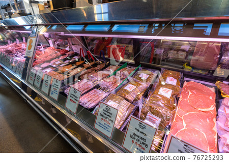 Granville Island Public Market. People wearing face mask for shopping indoors during covid-19 pandemic period. Vancouver, BC, Canada. 76725293