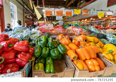 Granville Island Public Market. An indoor market featuring a fascinating assortment of colourful food and produce stores. Vancouver, BC, Canada. 76725295