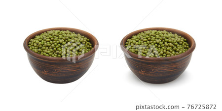 mung beans in clay bowl on white background, isolated and with shadow mung beans in clay bowl on white background, isolated and with shadow 76725872