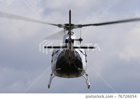 The back view of the helicopter? 76726054