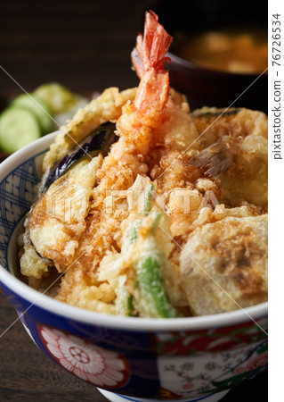 Bowl of rice and fried fish Bowl of rice and fried fish 76726534