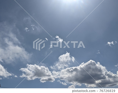 A photo of the sky reflecting the sunlight 76726819