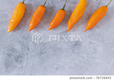 Peruvian yellow pepper. Yellow pepper used in Peruvian cuisine. Peruvian yellow pepper. Yellow pepper used in Peruvian cuisine. 76726843