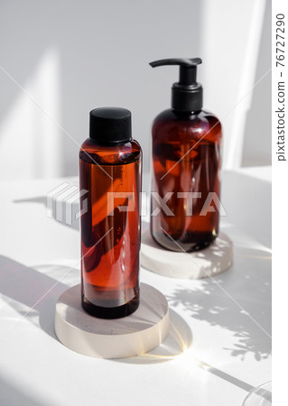 Natural beauty products. Mineral organic oil. Eco cosmetic cream, serum, skin care blank bottle. Face and body teatment, spa salon Natural beauty products. Mineral organic oil. Eco cosmetic cream, serum, skin care blank bottle. Face and body teatment, spa salon 76727290