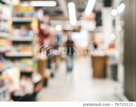 blurred supermarket aisle 76733213