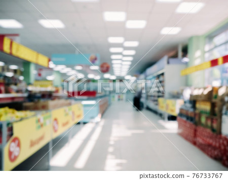 blurred supermarket aisle blurred supermarket aisle 76733767