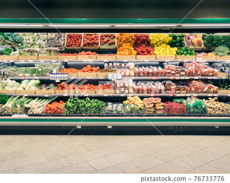 Fresh vegetables on shelf in supermarket 76733776