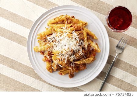 Salsiccia ragout sauce with Garganelli Pecorino Romano Salsiccia ragout sauce with Garganelli Pecorino Romano 76734023