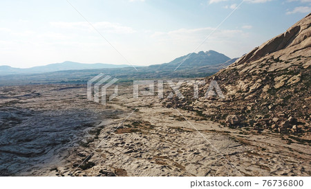 Huge rocks from lava. A former volcano. Huge rocks from lava. A former volcano. 76736800
