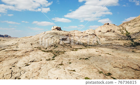 Huge rocks from lava. A former volcano. Huge rocks from lava. A former volcano. 76736815