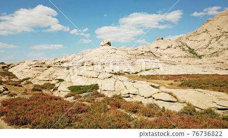 Huge rocks from lava. A former volcano. 76736822