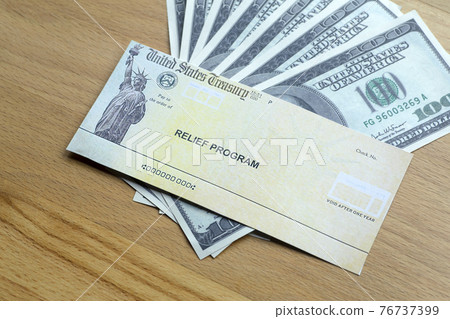 USA dollars background. American rescue plan, USA relief program, stimulus check and Act of 2021 concept. Money, business, profit and livelihood idea 76737399