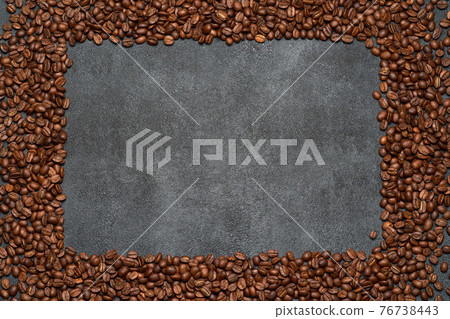 Background or texture made of roasted brown coffee beans Background or texture made of roasted brown coffee beans 76738443