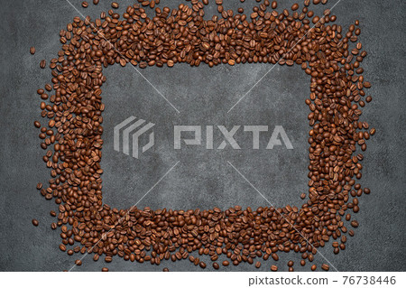 Background or texture made of roasted brown coffee beans Background or texture made of roasted brown coffee beans 76738446