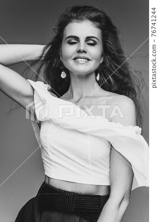 black and white picture of handsome woman with 76741244