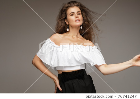 Glamorous girl in black and white. 76741247