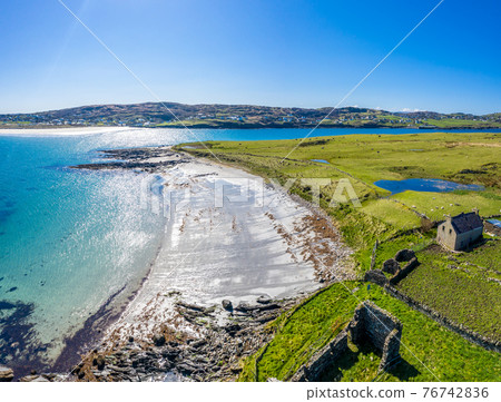 Aerial view of Dunmore Head by Portnoo in County Donegal, Ireland. Aerial view of Dunmore Head by Portnoo in County Donegal, Ireland. 76742836