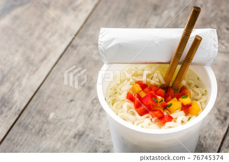 Take away noodles with vegetables Take away noodles with vegetables 76745374