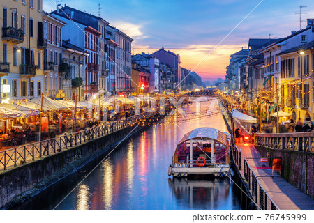 Naviglio Grande canal in Milan, Italy, on sunset Naviglio Grande canal in Milan, Italy, on sunset 76745999