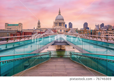 Millenium bridge and St Pauls Cathedral in London, England, UK 76746869
