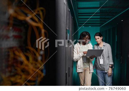 Women Managing Servers in Data Center Women Managing Servers in Data Center 76749060