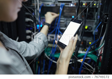 Woman Working with Server Close Up Woman Working with Server Close Up 76749172