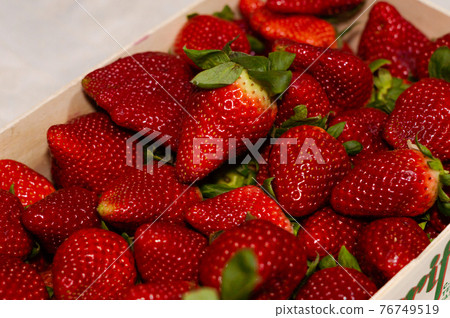 A crate of red strawberries fruit from farm A crate of red strawberries fruit from farm 76749519
