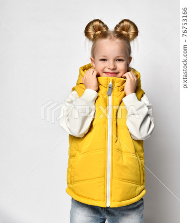 fashionable teen girl posing in autumn waistcoat 76753166