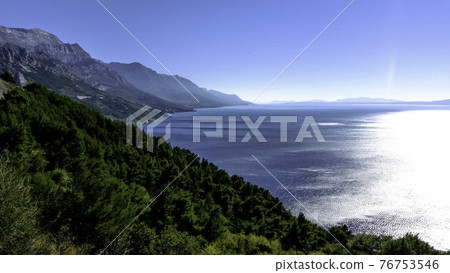 Adriatic Sea, beach and forest - Podgora, Makarska Riviera, Dalmatia, Croatia Adriatic Sea, beach and forest - Podgora, Makarska Riviera, Dalmatia, Croatia 76753546