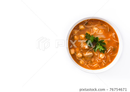 Harira soup in bowl isolated on white background 76754671