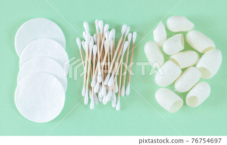 Cotton cosmetic removers and skin care products pads, cotton swabs, silkworm cocoons 76754697